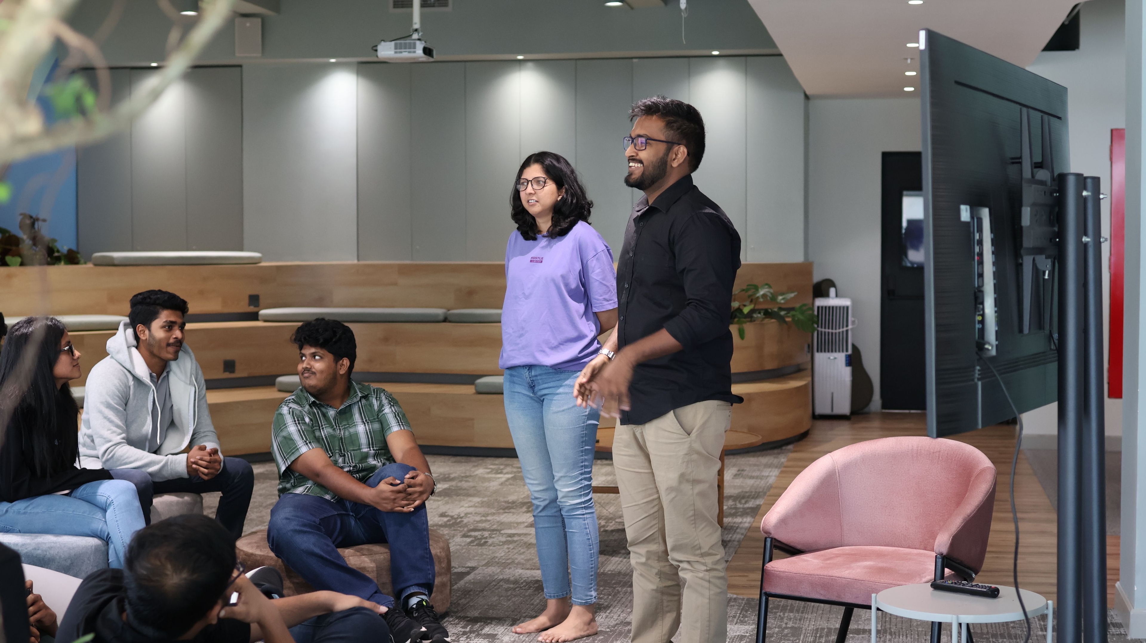 Technical workshop session with team members collaborating