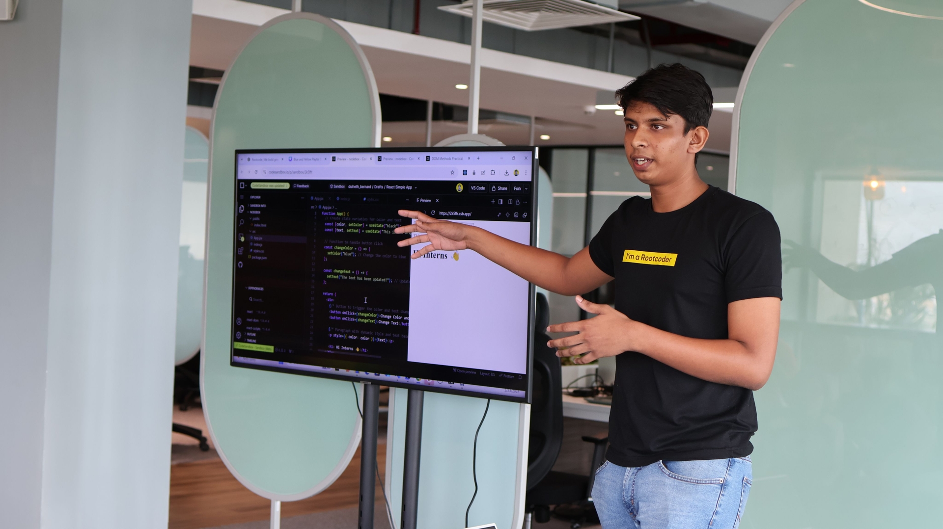 Person giving a presentation at a computer workstation